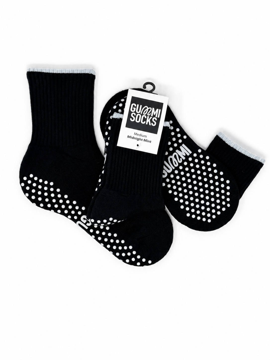 GUMMI Midnight Mint black Pilates grip socks with white sole grips and branded product tag