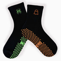 Ghoulish Gummies Halloween grip socks with orange and green non-slip soles