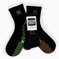 Black Halloween Reformer grip socks with mismatched ghost and spider embroidery