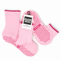 GUMMI Sugar Gummi Balls pastel pink crew Pilates grip socks with raspberry grip detailing, shown in a flat lay