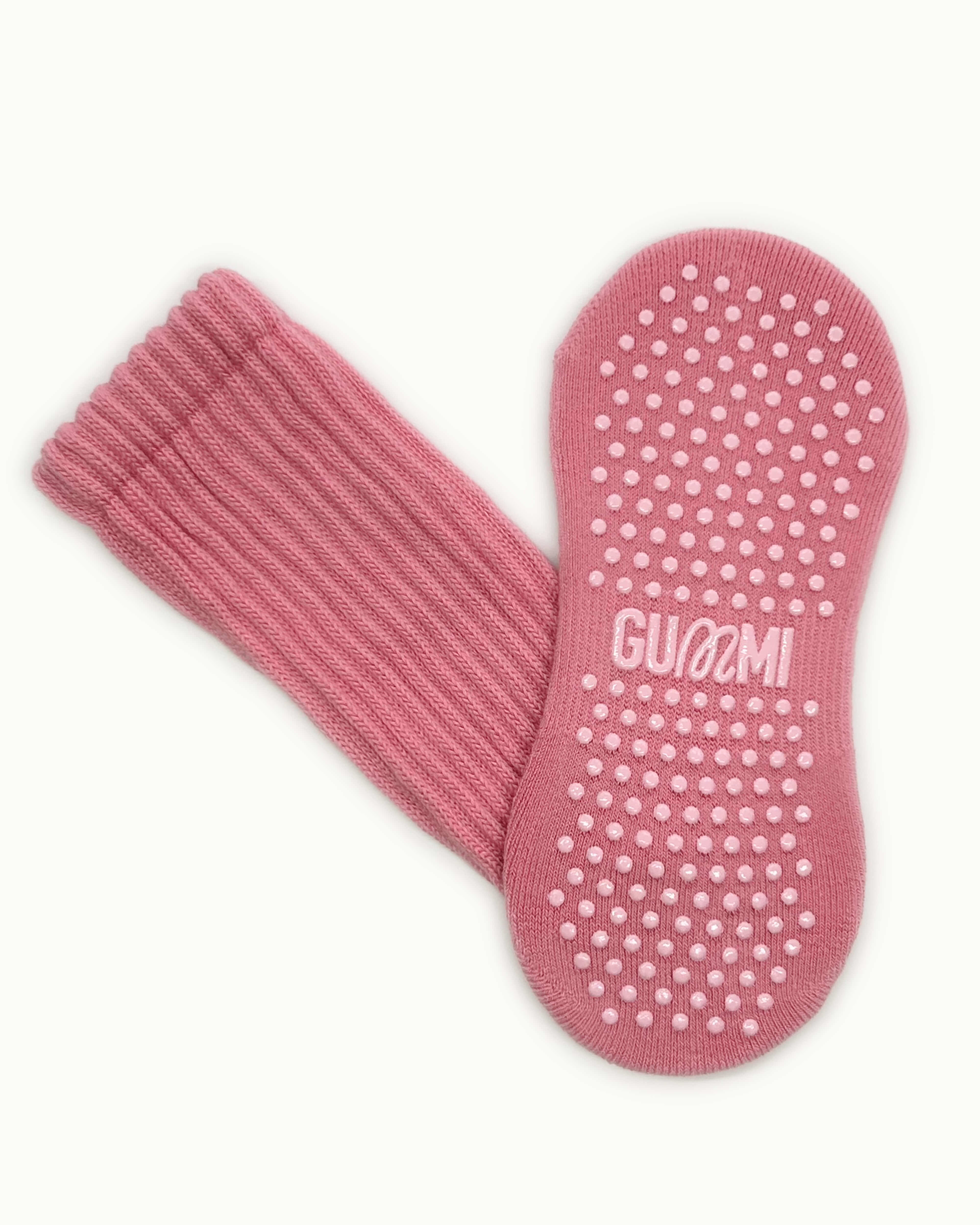 Non-slip sole of black GUMMI grip socks for Pilates, reformer, yoga and barre.