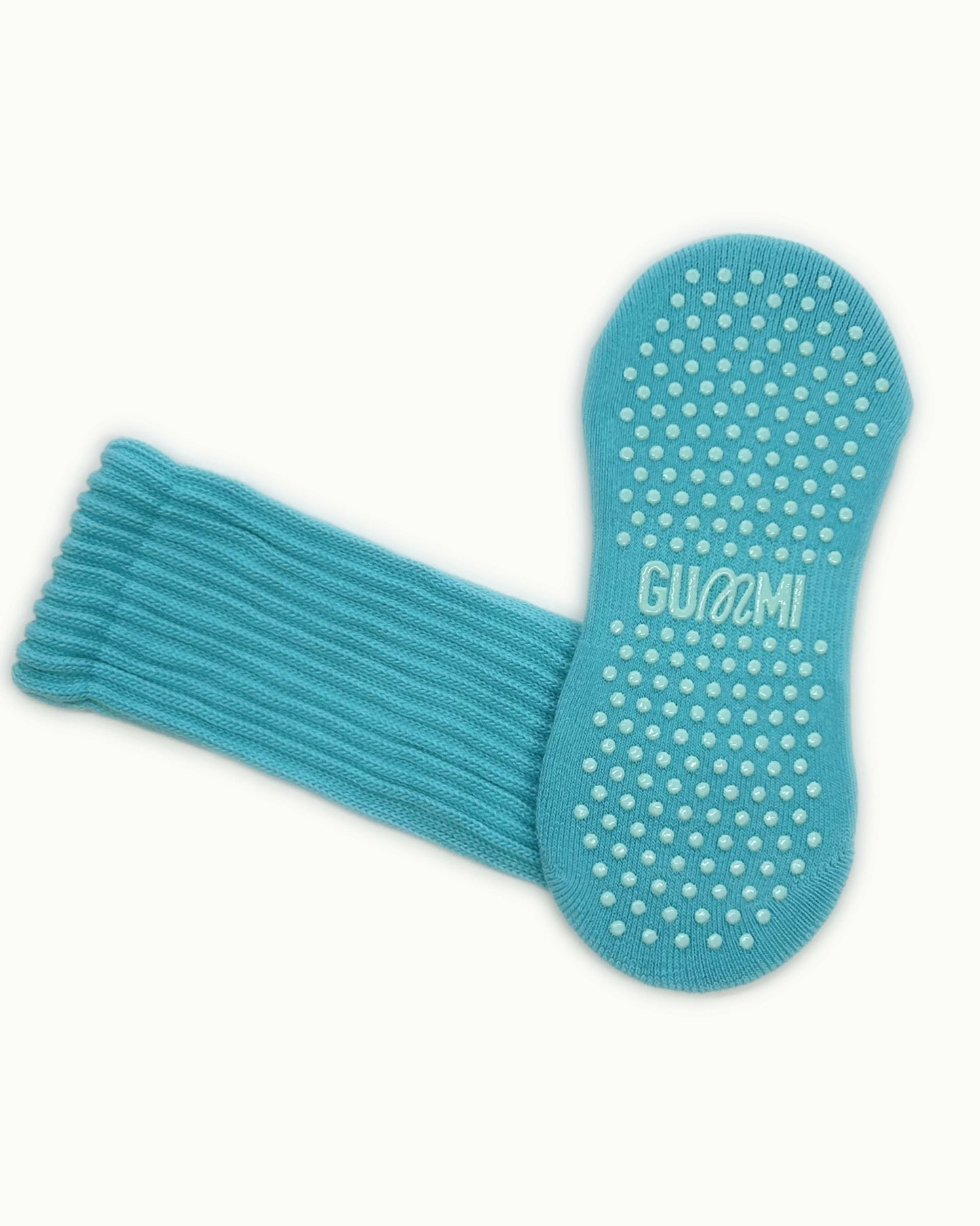Blue slouchy grip socks with GUMMI socks logo