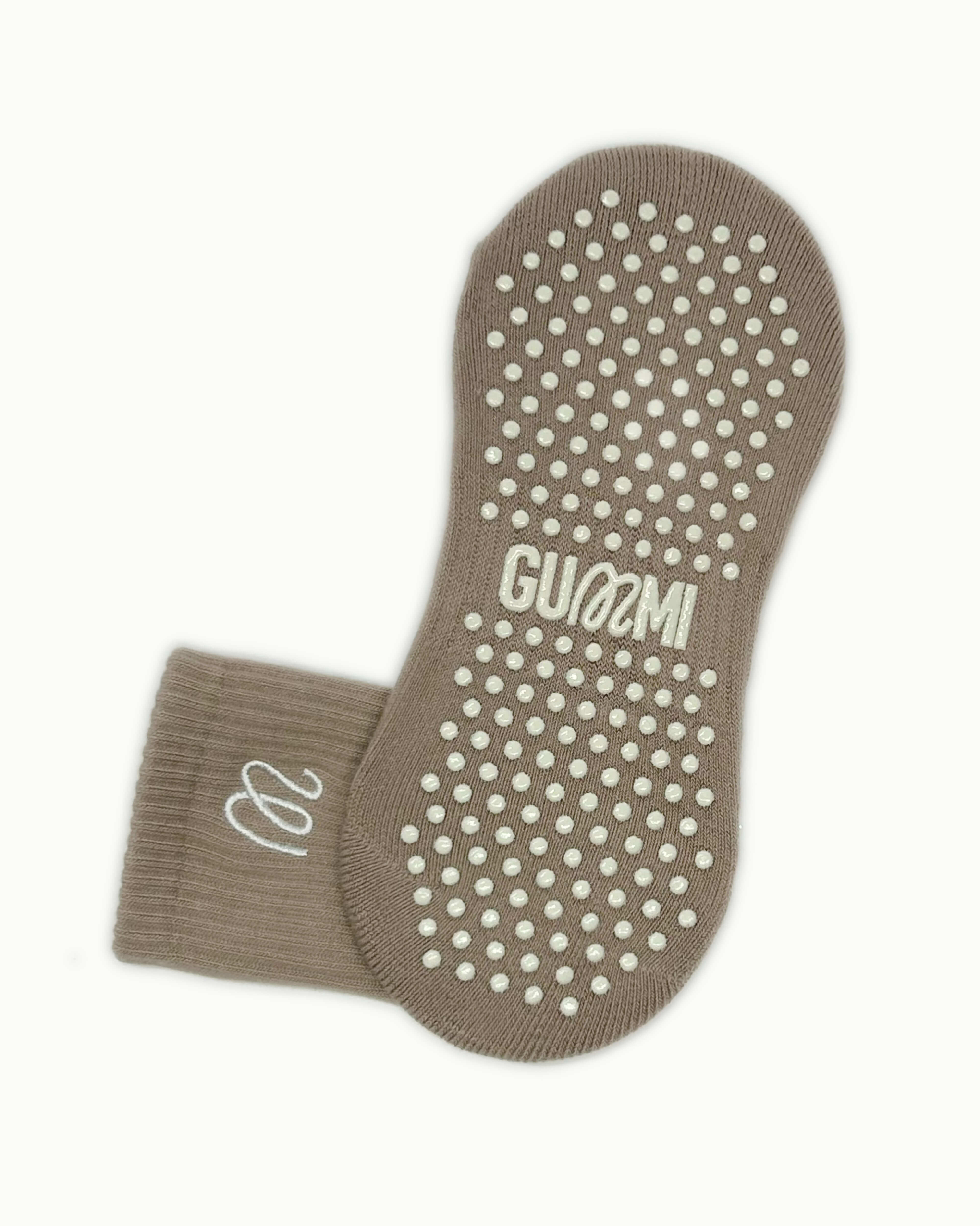 Non-slip sole of taupe GUMMI grip socks for Pilates, reformer, yoga and barre.