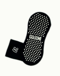 Non-slip sole of black GUMMI grip socks for Pilates, reformer, yoga and barre.