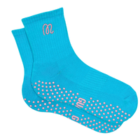 Blue socks with pink grip dots and logo on a white background