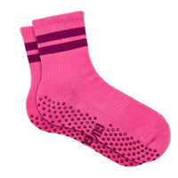 Pink socks with purple stripes and textured sole on a white background