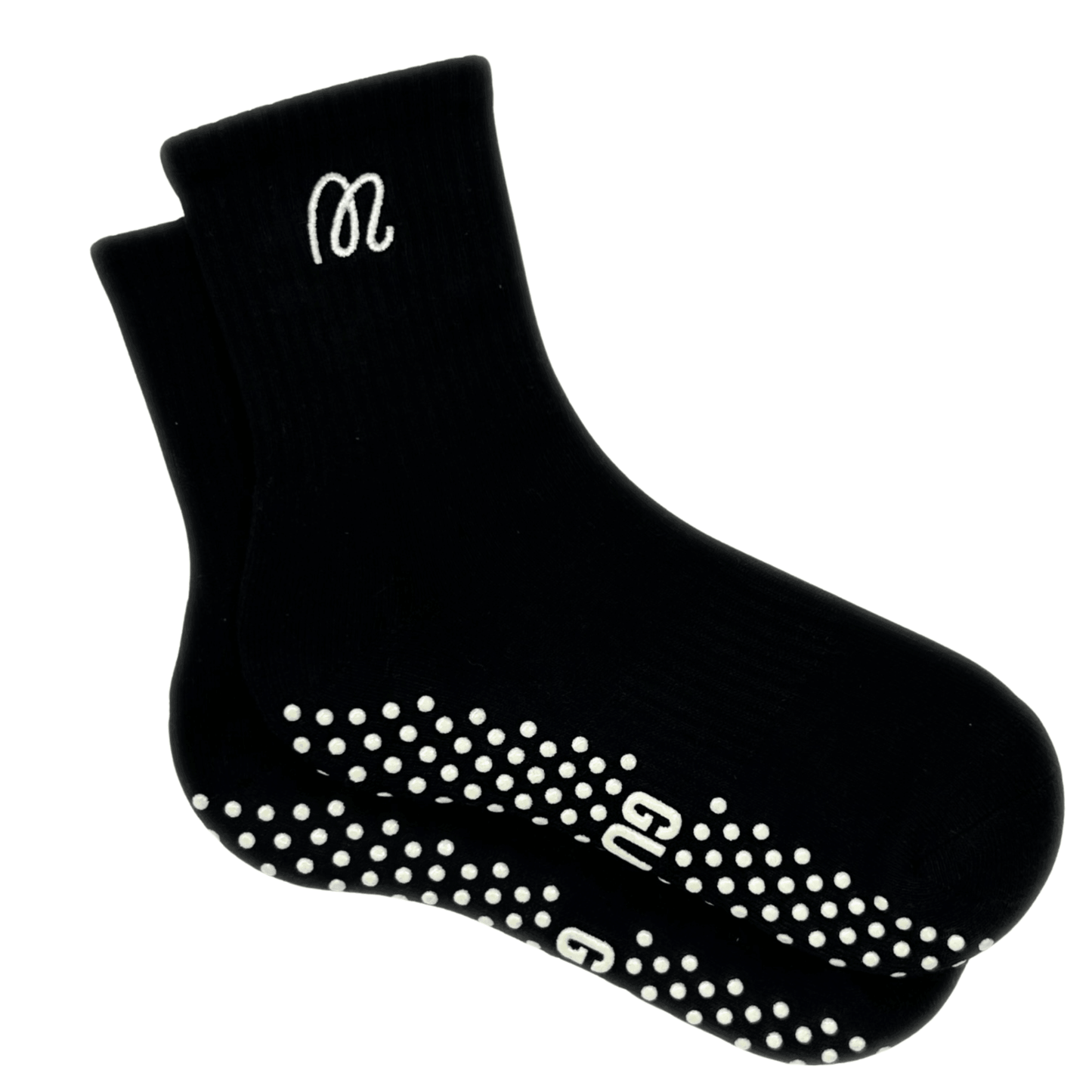 Black grip socks with white grip dots and logo on a white background