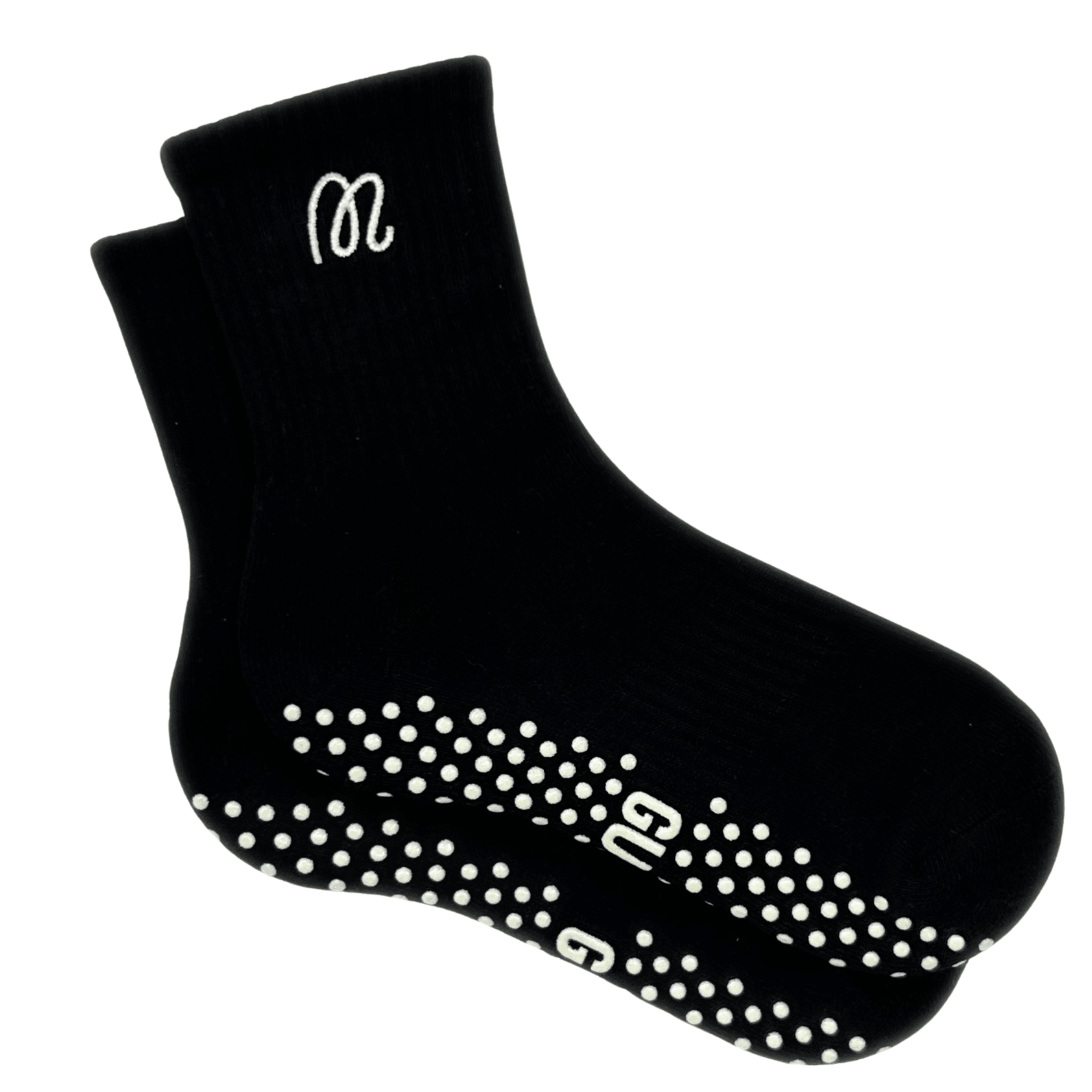 Black grip socks with white grip dots and logo on a white background
